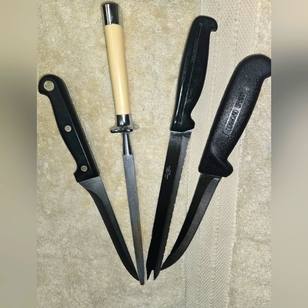 Three knives, one sharpener. Different top brands. Excellent condition!